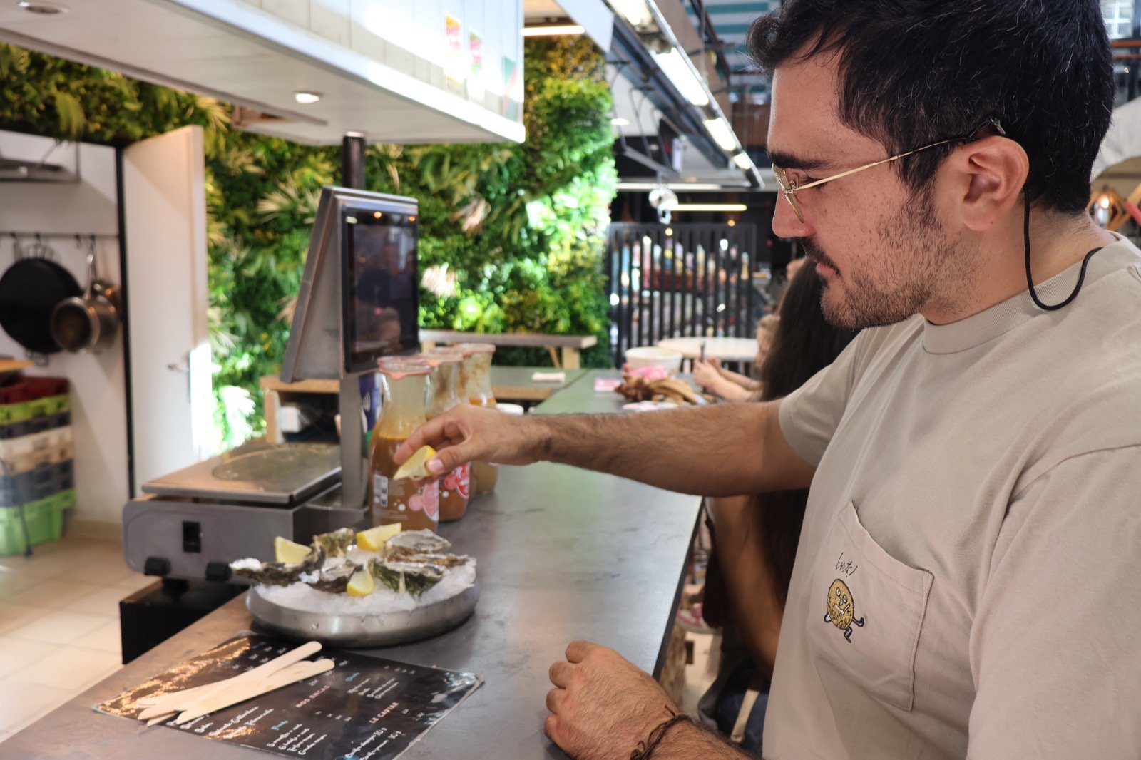 Fresh oysters at a French coastal market counter