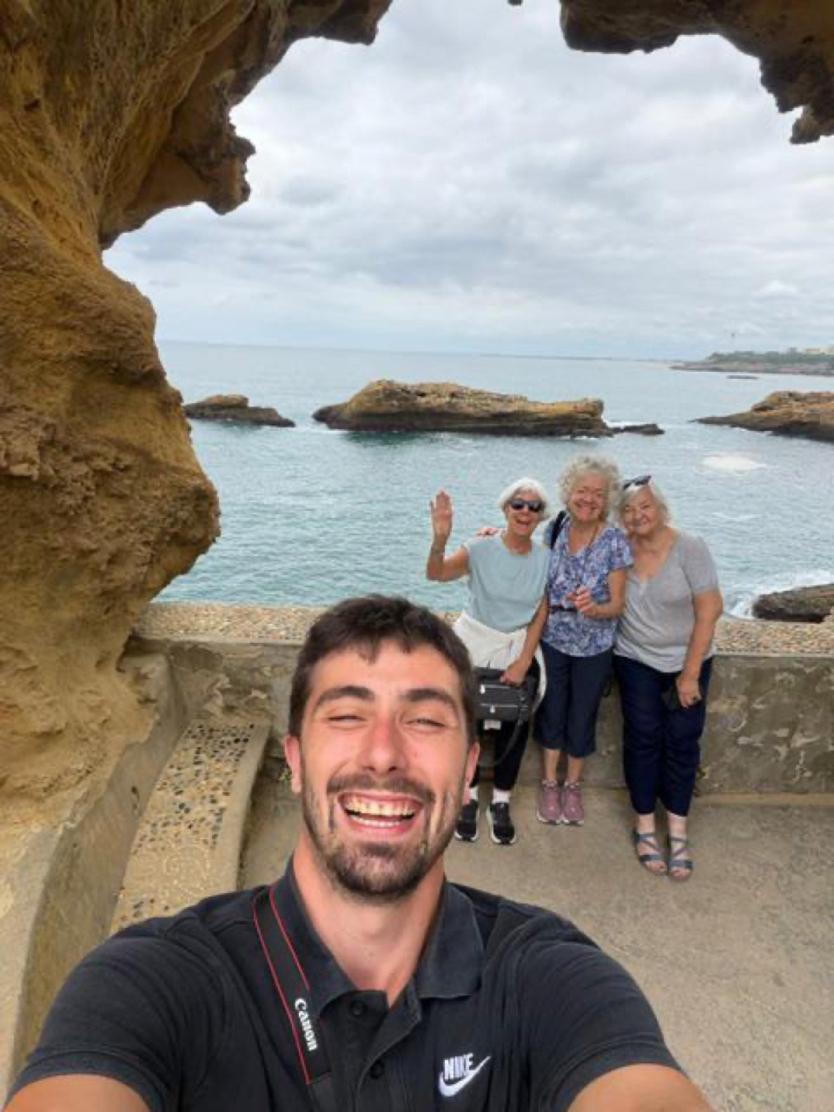 Alex with clients at the Rocher de la Vierge viewpoint in Biarritz