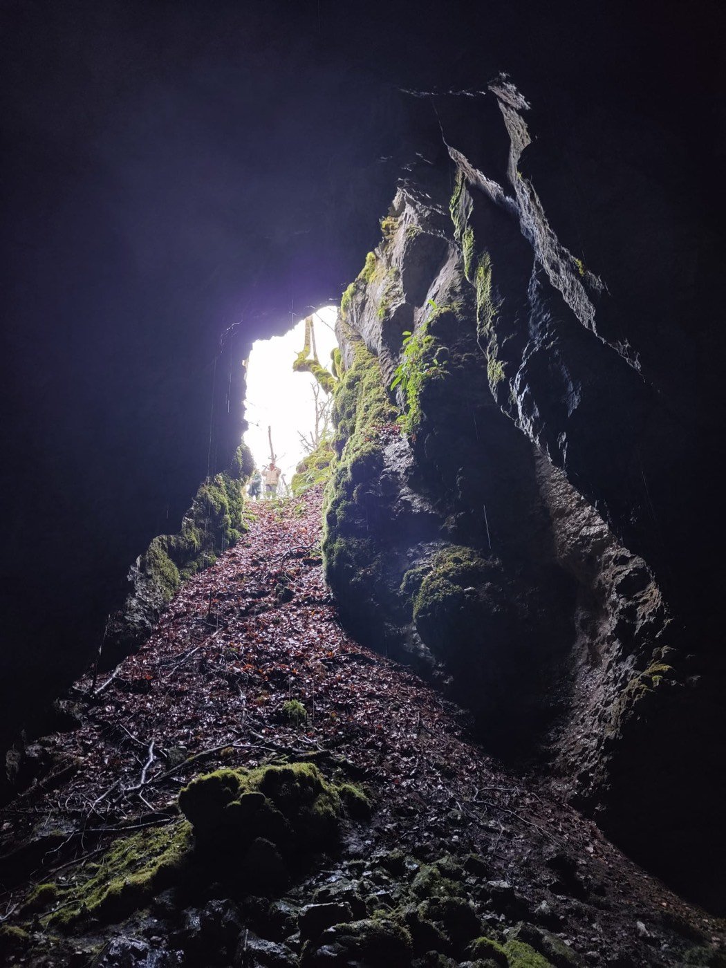 Looking out from inside a natural cave in the Larraún valley