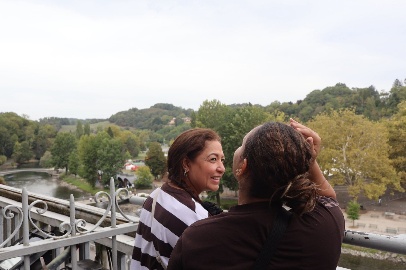 A quiet moment on the bridge over the Gave, Pyrenees foothills behind